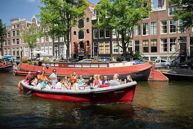 Amsterdam Light Festival: Saloon Boat Cruise + Hot Drinks & Bite - A Light Festival cruise that feels like real Amsterdam, not just lights