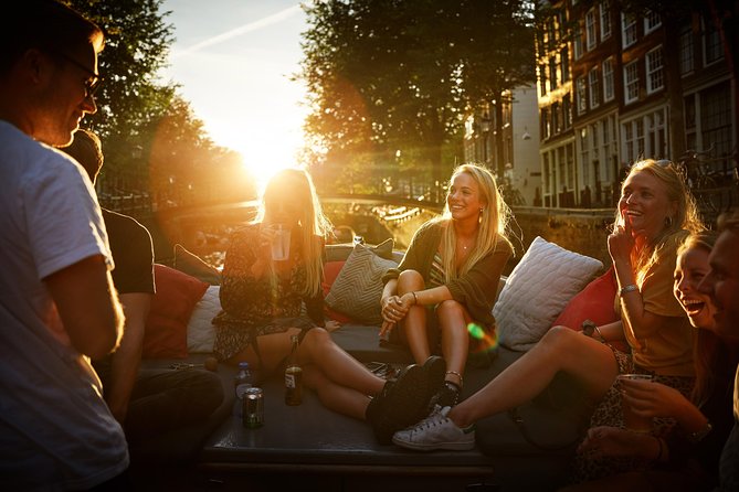 Amsterdam Light Festival: Saloon Boat Cruise + Hot Drinks & Bite - Crowds, seat angles, and hearing the guide