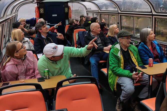 Amsterdam Live Guided Sightseeing Canal Cruise - Starting at Amstel 51F: Easy Meeting Point, Short Time, Big Payoff