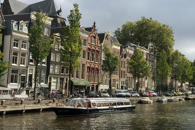 Amsterdam Live Guided Sightseeing Canal Cruise - Houseboat and Canal Museums: How Amsterdam Keeps Its Past Visible