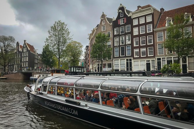 Amsterdam Live Guided Sightseeing Canal Cruise - Hermitage Museum and Magere Brug: The Skinny Bridge Finale