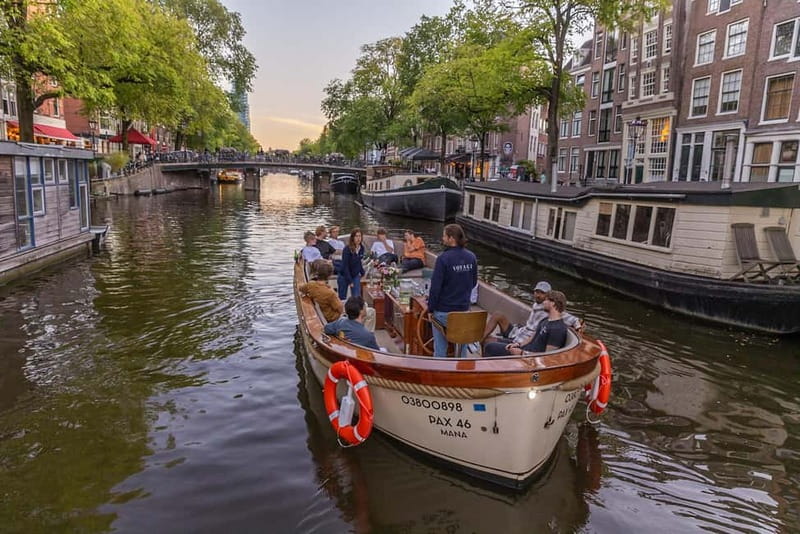 Amsterdam: Luxury Canal Cruise with Optional Snacks & Drinks - Cheese, province houses, and the houseboat alley vibe