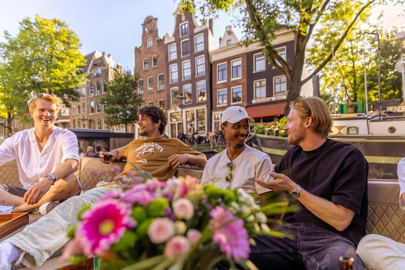 Amsterdam: Luxury Canal Cruise with Optional Snacks & Drinks - Oudenschans, the Dancing Houses, and the city’s busy centers