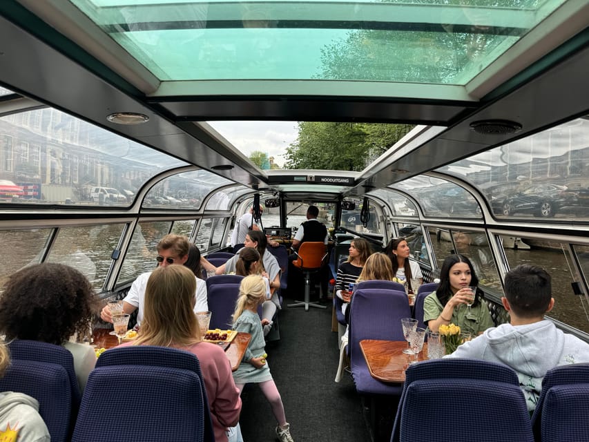 Amsterdam: Luxury Cheese & Wine Canal Cruise - The Onboard Guide: English or Dutch Storytelling That Makes the Hour