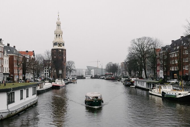 Amsterdam Newest Canal Cruise with local guide and small group - Meeting by Amsterdam Central Station: Start Fast, Not Stress