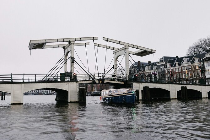 Amsterdam Newest Canal Cruise with local guide and small group - Sea Palace and the City’s Food-Story Energy