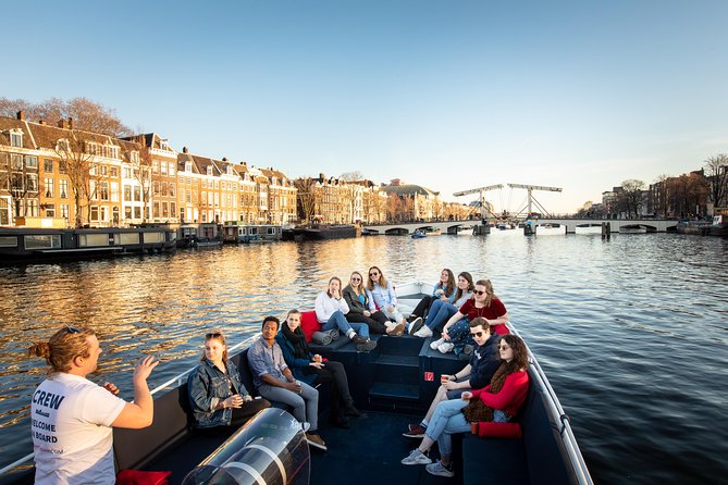 Amsterdam Open Boat Cruise with Live Guide and Two Drinks - First, Know What You’re Riding: Electric Open-Air Canal Boat with Heated Seats