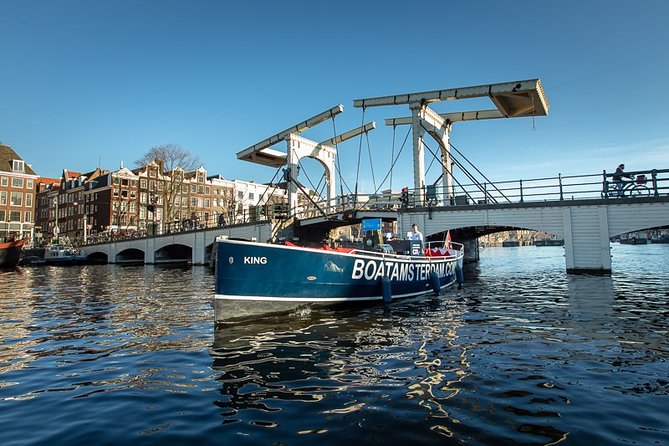 Amsterdam Open Boat Cruise with Live Guide and Two Drinks - The Route Highlights: Amstel River, Magere Brug, and the Amsterdam Canal Ring