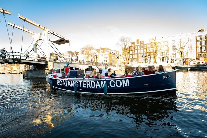 Amsterdam Open Boat Cruise with Live Guide and Two Drinks - Two Drinks and Live Commentary: How the Guide Makes It Worth It