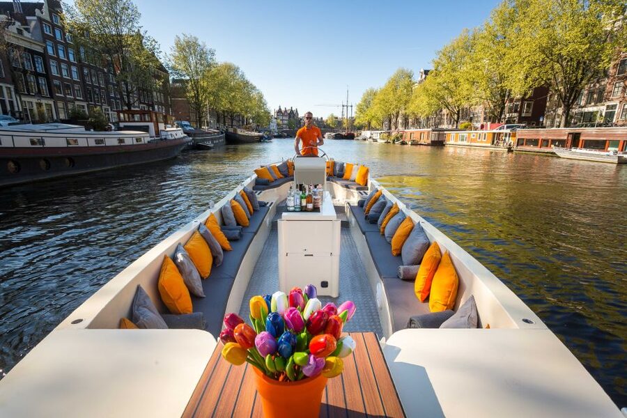 Amsterdam: Private Prosecco Canal Cruise Tour - Prosecco on a silent lifeboat: the party vibe, adjusted for real rules