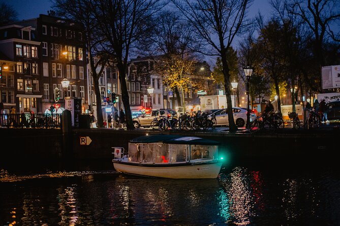 Amsterdam: Private Romantic Evening Canal Cruise + Bubbles/Snacks - Electric Boat Comfort: Blankets, Heat, Roof, and the No-Restroom Reality