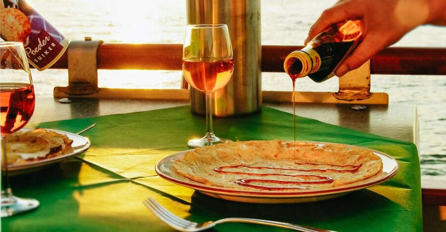 Amsterdam: River Cruise With All-You-Can-Eat Dutch Pancakes - Your 75 minutes on the IJ: a sideways view of Amsterdam