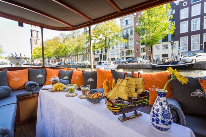 Amsterdam Small-Group Bike Tour With Canal Cruise, Drinks, Cheese - Start at Amsterdam Centraal: Pierre Cuypers Sets the Tone