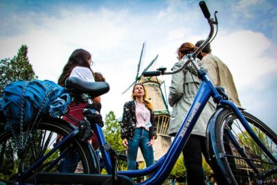 Amsterdam Small-Group Bike Tour With Canal Cruise, Drinks, Cheese - Small-Group Reality: Max 10 Means Better Control, Not Guaranteed Slow