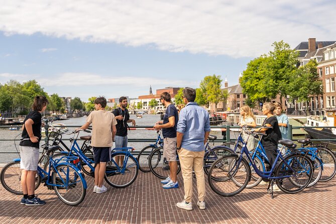 Amsterdam Small-Group Bike Tour With Canal Cruise, Drinks, Cheese - De Gooyer Windmill, ARTIS Zoo Edges, and a Skinny Bridge Crossing