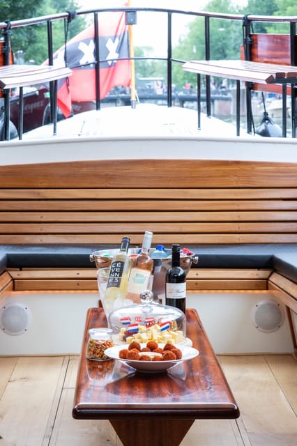 Amsterdam: Small-Group Canal Cruise incl. Drinks and Snacks - Stop by Stop: What the Route Feels Like From the Boat