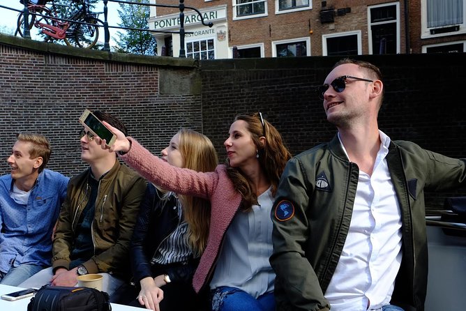 Amsterdam Small-Group Canal Cruise Including Snacks and Drinks - The route hits the Amsterdam Canal Ring, Amstel, and the Red Light District