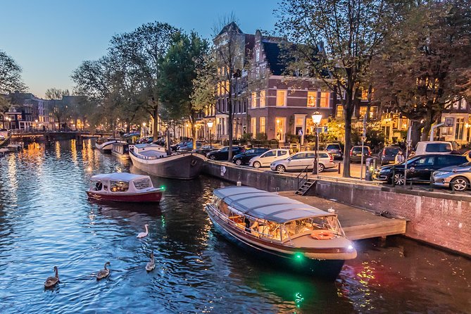 Amsterdam Small-Group Evening Canal Cruise Including Wine, Craft Beer, Cheese - Night lighting vs. just plain views: choosing the right departure time