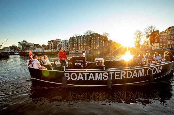 Amsterdam Sunset Canal Cruise with Live Guide and Open Bar - Seasonal Weather: Open Boats in Summer, Heated Seats in Winter