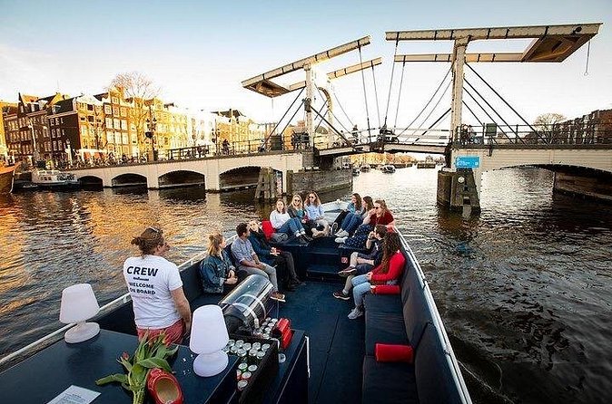 Amsterdam Sunset Canal Cruise with Live Guide and Open Bar - Price and Value: About $36.30 for a lot of guided sightlines