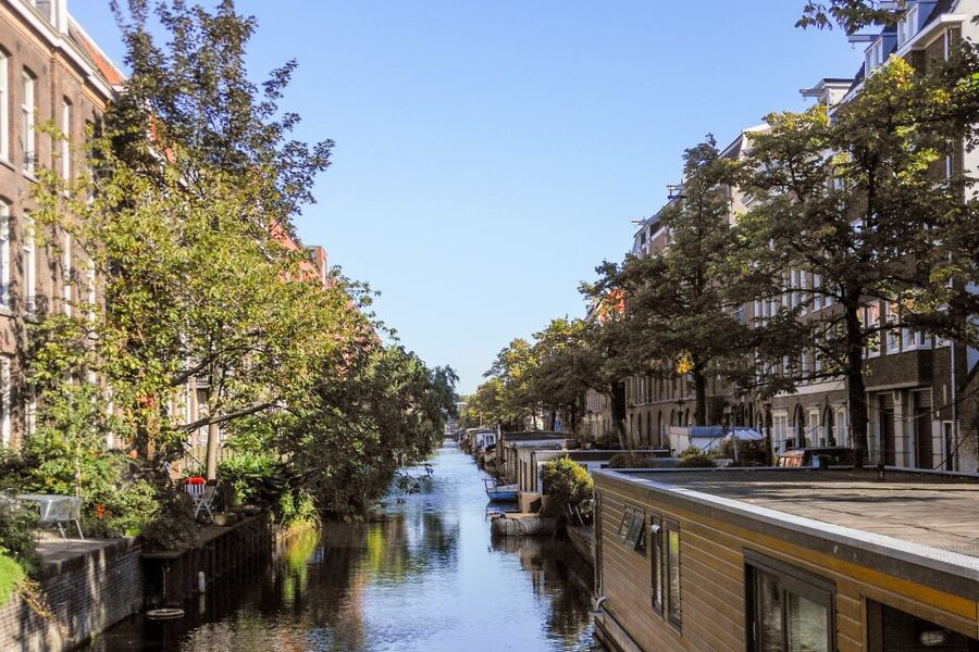 Amsterdam Walking Tour and Canal Cruise - Jordaan district stroll: the neighborhood that feels like Amsterdam living