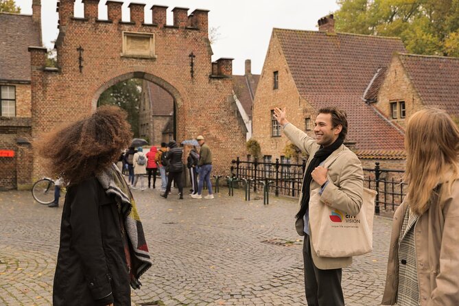 Bruges Guided Day Trip with Canal Cruise Option and Hotel Pickup - Minnewater Lake: Swans, Love Notes, and Old-Port Atmosphere