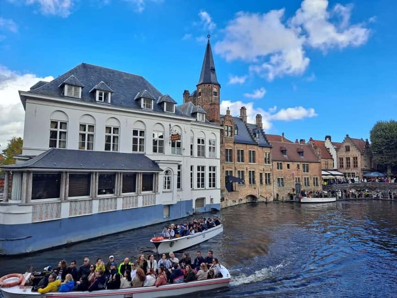 Day trip to Bruges from Paris with canal cruise - Small-group Bruges starts with a minivan, not a cattle car