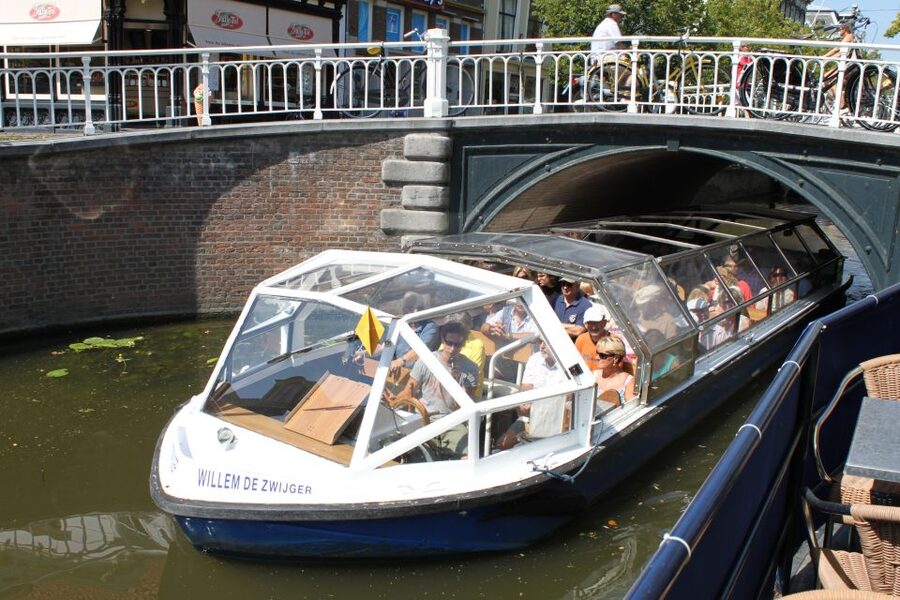 Delft: Canal Cruise with Guided Commentary - The Story the Guide Tells: Delft Blue, Vermeer, and Trade