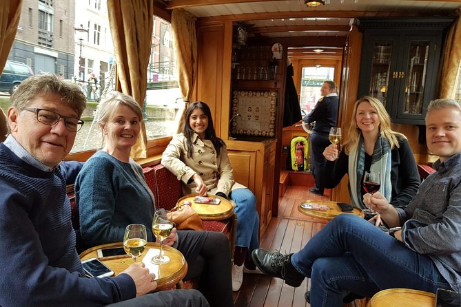 Eating Amsterdam: Food Tour & Canals Cruise - Café De Poort Amsterdam: Gouda tastings from young to aged