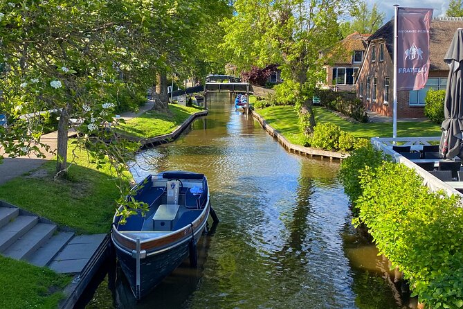 From Amsterdam: Giethoorn Day Trip with Canal & Village Tour - Giethoorn Arrival: Village Time Built Around the Canals