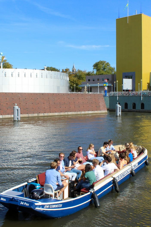 Groningen: Open Boat City Canal Cruise - The open boat experience: seats, low bridges, and weather reality