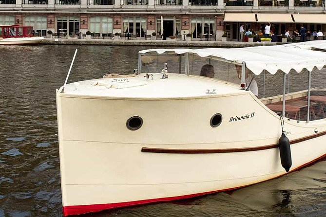 Guided Amsterdam Canal Cruise – Snacks & Drinks on board(1 Hour) - Synagogues, remembrance, and the Herengracht merchant mansions