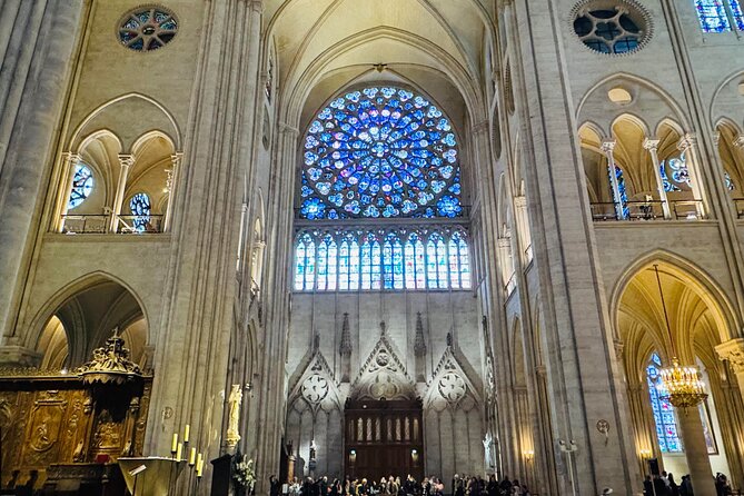 Inside Notre Dame Tour with Optional Seine River Cruise - Stepping inside with audio headsets: nave, chapels, and rose windows
