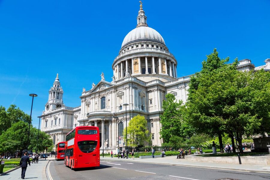 London in One Day Tour with River Cruise - Westminster by coach: Parliament Square, Big Ben, and Westminster Abbey exterior focus