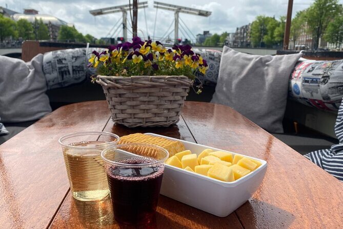 Luxury Amsterdam Canal Cruise – Unlimited Cocktails Included (1H) - The oldest canal and early buildings: a shortcut to real Amsterdam