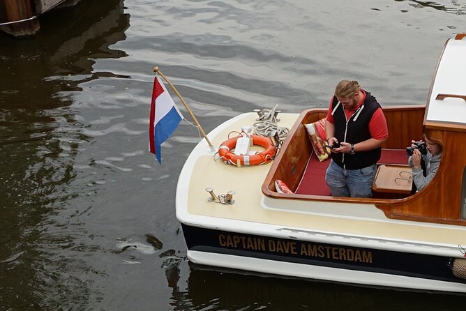Morning Canal Cruise Amsterdam in Small-Group - The 1928 saloon boat: “dry seats” and real warmth