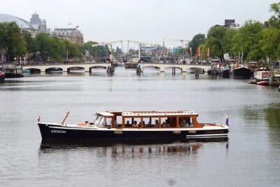 Morning Canal Cruise Amsterdam in Small-Group - Captain Dave’s style: stories, questions, and a real local voice
