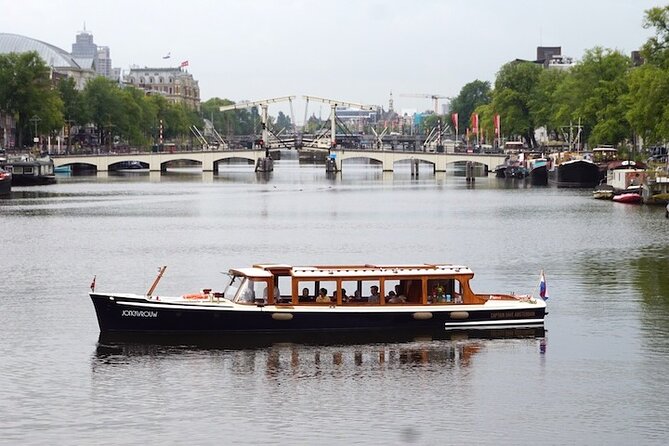 Morning Canal Cruise Amsterdam in Small-Group - Captain Dave’s style: stories, questions, and a real local voice