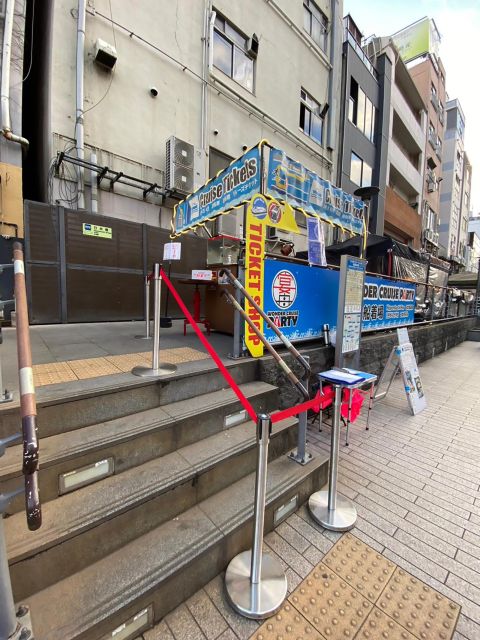 Osaka: Dotonbori District River Cruise with Drink Discount - The covered boat experience: warm, seated, and practical