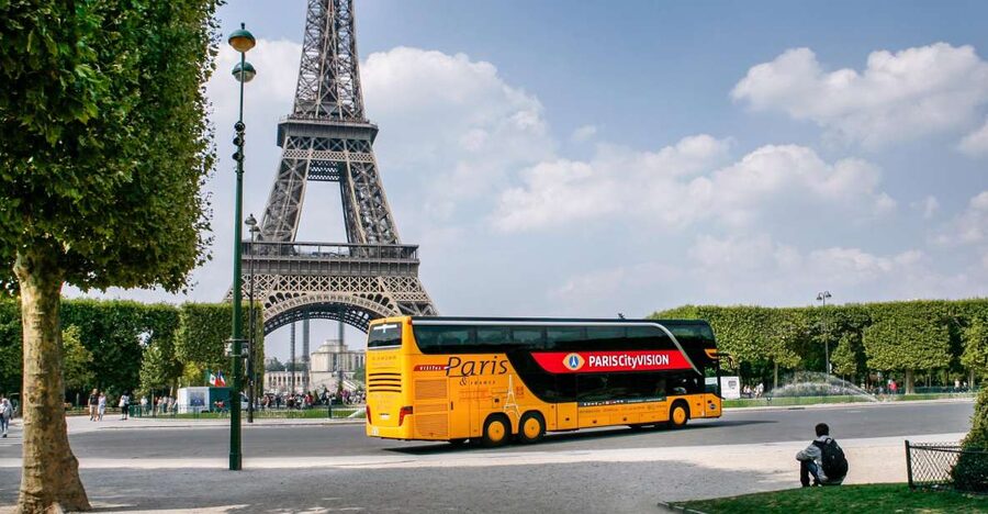 Paris: Audio-Guided Bus Tour & Seine River Cruise - The luxury coach ride: panoramic views plus a host-led flow