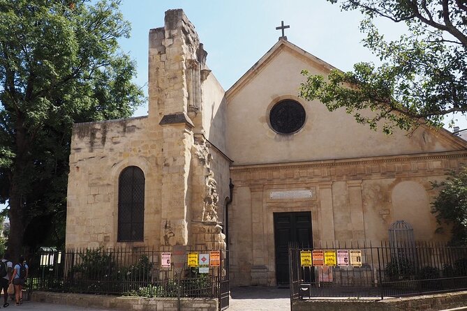 Paris Latin Quarter Walking Tour plus Seine River Cruise Option - Eglise Saint-Julien-le-Pauvre: a courtyard with Paris’s oldest living tree