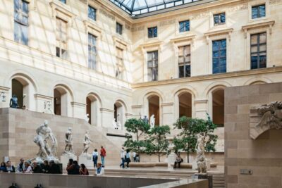 Paris: Louvre Museum Entry Ticket With Host and River Cruise - Your Louvre start: moving from the meeting point to the Mona Lisa