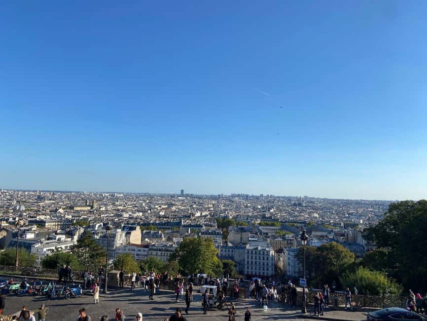 Paris: Montmartre Private Guided Tour & River Cruise Option - Moulin Rouge at the foot of the hill: the big finale