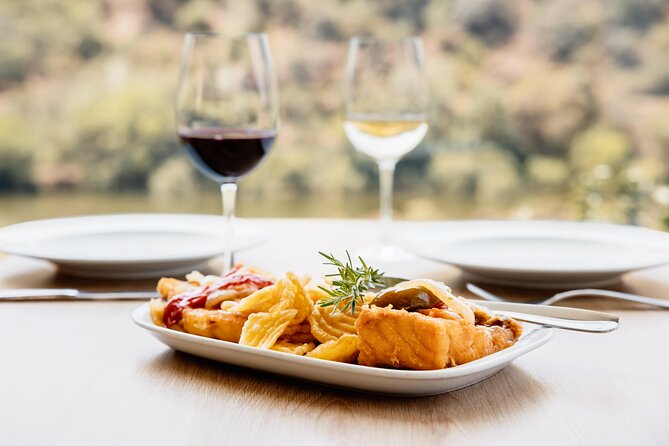Pinhão: Douro River Cruise with Lunch Included - The full day, in plain terms: boat down, lunch on land, train back