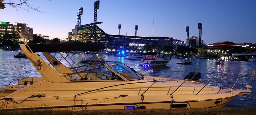 Pittsburgh: Private Yacht River Cruise with Captain and BYOB - The boat setup: hood for sun, cover for weather, and space to breathe