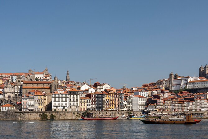 Porto 360°: Helicopter Flight, Guided Walking Tour & River Cruise - The helicopter over Douro Bridge: the best views happen quickly