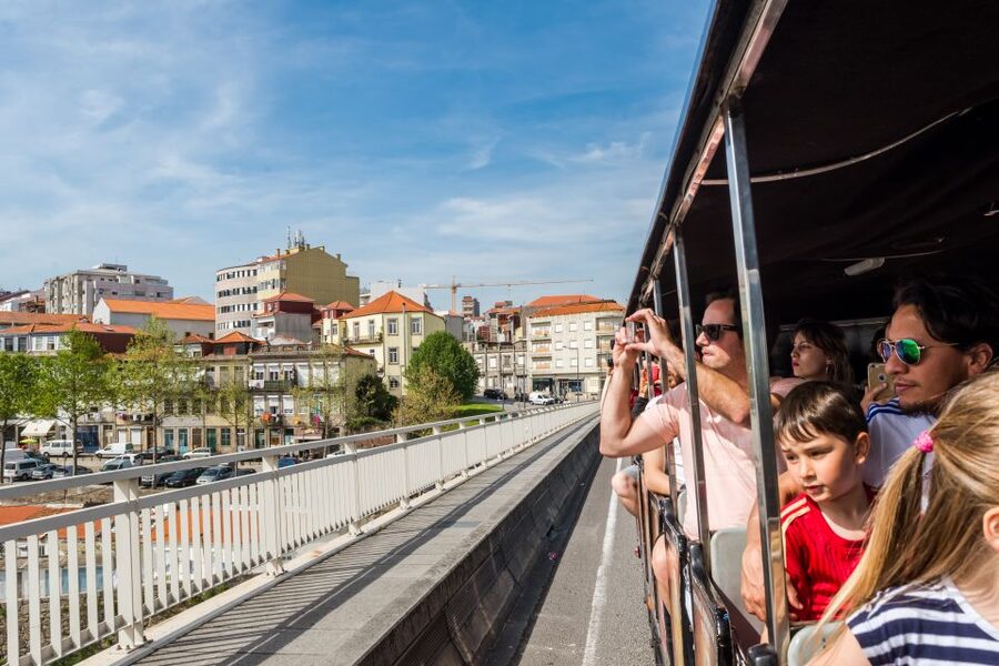 Porto: City Train Tour, River Cruise & Wine Cellar - Real Companhia Velha: film, old cellars, and two port wines