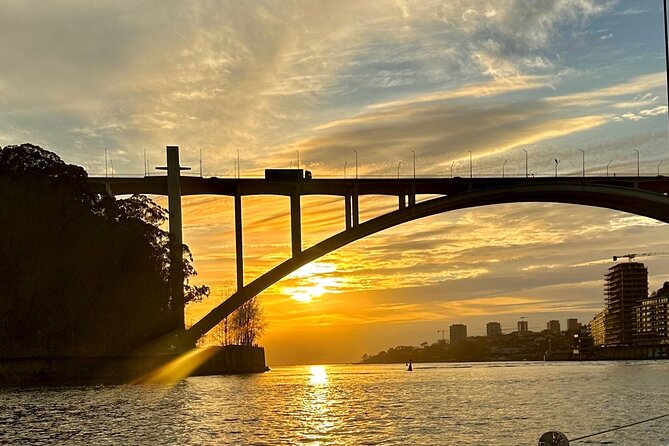 Porto: Yacht Small-Group Douro River Cruise & 6 Bridges w/ Drink - Stop-by-stop: from Ponte da Arrabida to the river mouth at sunset