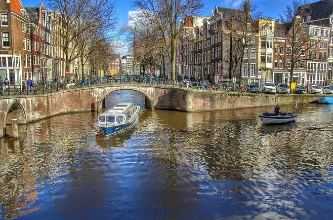 Private Anne Frank tour with canal cruise - Dam Square and De Schaduwkade: Closing the Loop in the City Center