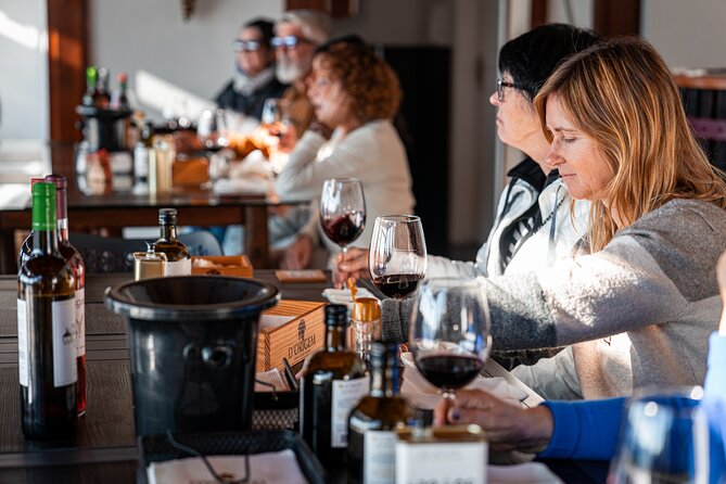 Private Douro Valley Tour: Boutique Winery & River Cruise - Peso da Régua passing stop: wine commerce and a museum you can look up